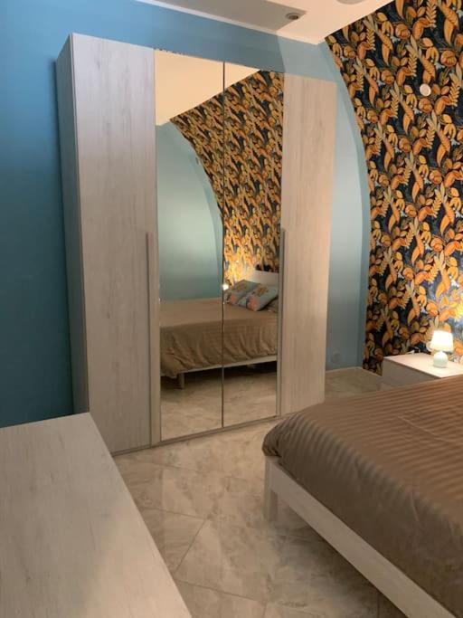 Casa - Torre Dell'Orologio Apartment คาโนซา ดิ พูเจลีย ภายนอก รูปภาพ